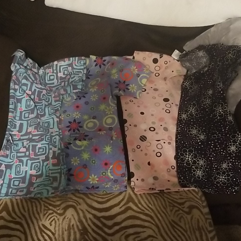 Bundle of 4 XS scrubs tops.